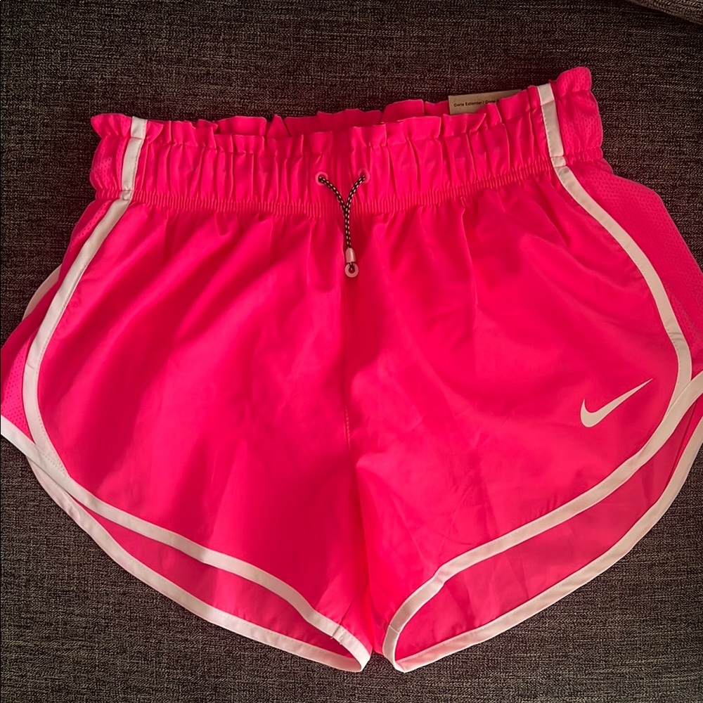 Nike Pink Athletic Shorts with Curved Hem and Elastic Waistband

NEW 🔝